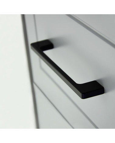 Tirador de mueble negro mate TECHNO tirador de diseño vista de cerca sobre un cajón