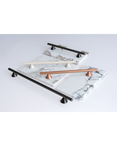 Tirador de mueble ROG tirador de diseño colocado sobre placas marmoladas