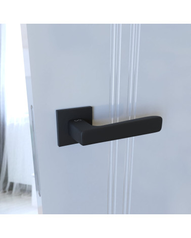 Manecilla de puerta negra PARMA diseño vista lateral sobre una puerta