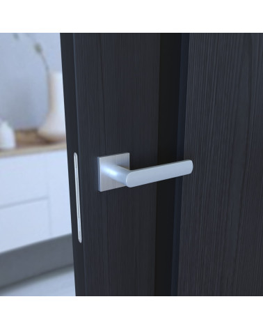 Tirador de puerta clásico TORINO ferretería de diseño vista lateral montada en una puerta