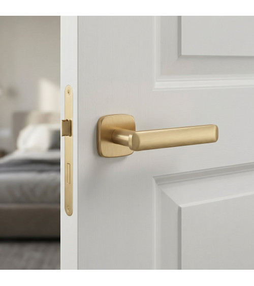 Tirador de puerta dorado satinado FORMA tirador de diseño