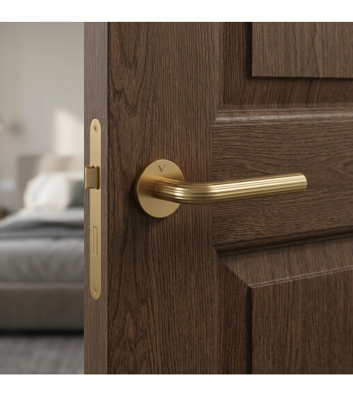 Manija de puerta oro satinado Frella manilla de diseño