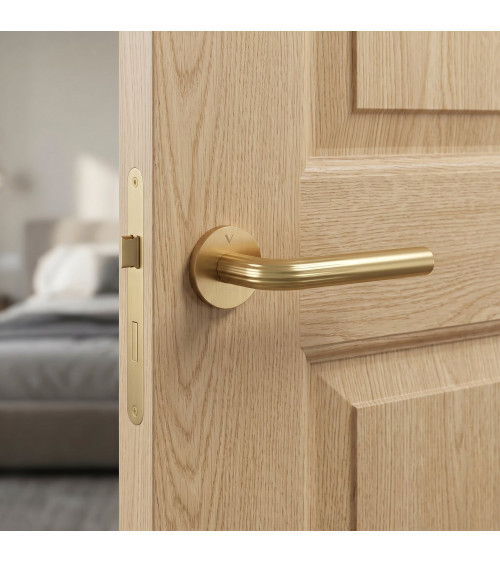 Manija de puerta oro satinado Frella manilla de diseño