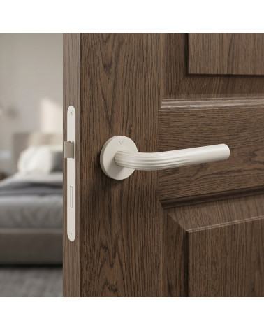Tirador de puerta minimalista en zamak FRELLA redondo