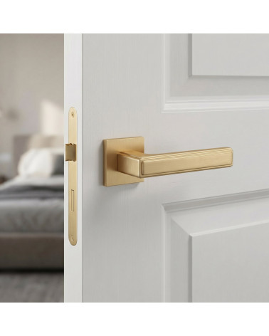 Manilla de puerta acabado oro satinado FRESIA