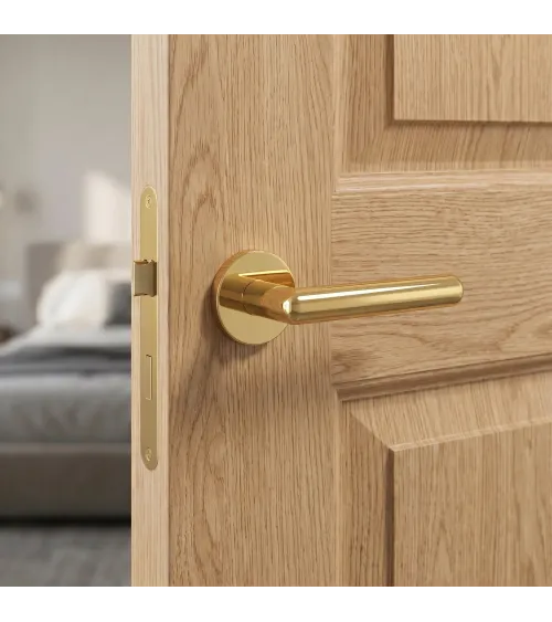Maneta de puerta dorada pulida OVAL 1750 maneta de diseño