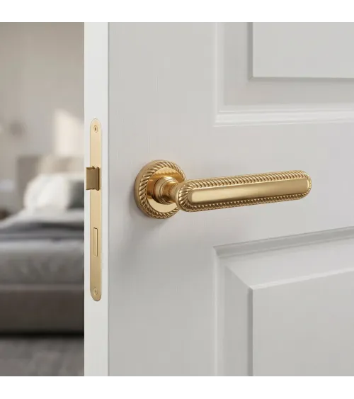 Tirador de puerta oro pulido Mandelli Coco diseño