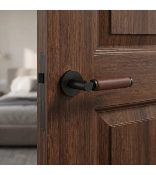 Manilla de puerta en latón y cuero oscuro TUPAI 4200/201 redonda - manilla design