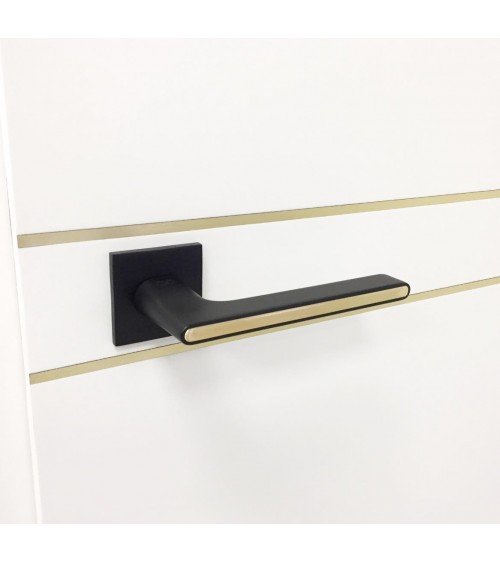 Manilla de puerta bicolor negra y dorada sobre placa cuadrada - modelo Ferrara - manilla de diseño