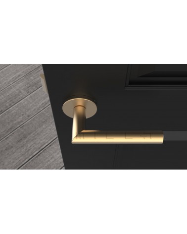 Manija de puerta color oro mate ARABIS diseño vista superior montada en una puerta
