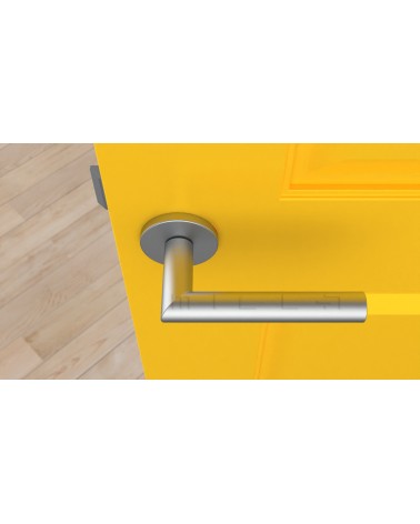 Manija de puerta color cromo satinado ARABIS manija de diseño vista superior montada en una puerta
