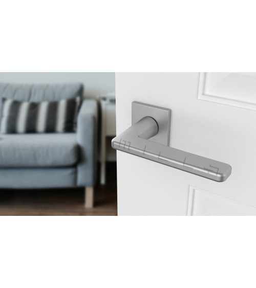 Tirador de puerta cromado satinado SETIA diseño decorativo