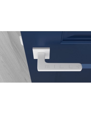 Tirador de puerta blanca YUKA herraje design vista superior montada en una puerta
