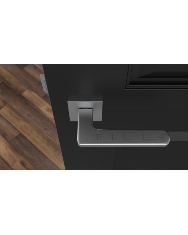 Palanca de puerta cromada satinada YUKA ferretería decorativa vista superior montada en una puerta