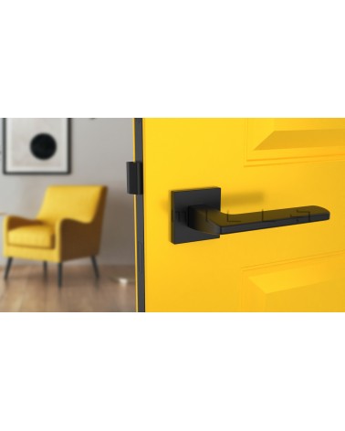 Tirador de puerta moderno YUKA tirador de diseño vista de frente montado en una puerta