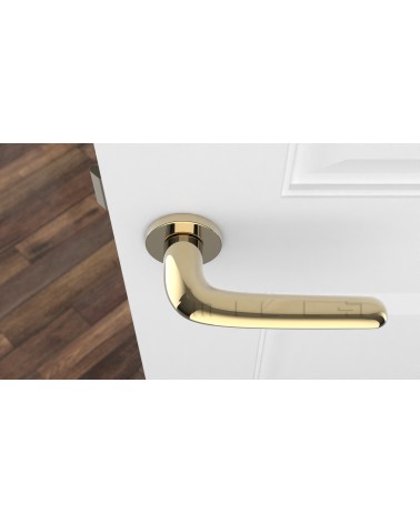 Tirador de puerta Dorada AZALIA tirador de diseño vista superior montada en una puerta