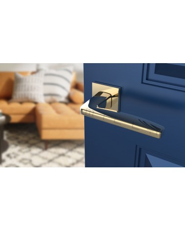 Manija de puerta oro pulido ERBA manija de diseño vista inclinada montada en una puerta