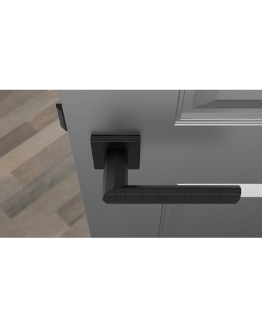 Maneral de puerta negro FRESIA maneral de diseño vista superior montado en una puerta