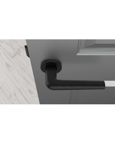 Tirador de puerta moderna FUNKIA tirador de diseño vista desde arriba montada en una puerta