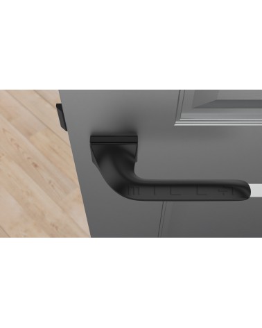 Tirador de puerta futurista GLADIOLA tirador de diseño vista desde arriba montada en una puerta