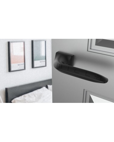 Tirador de puerta futurista GLADIOLA tirador de diseño vista desde arriba inclinada montada en una puerta