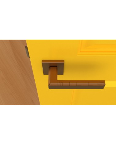Tirador de puerta moderna RAFLESIA tirador de diseño de color 1 montado en una puerta amarilla