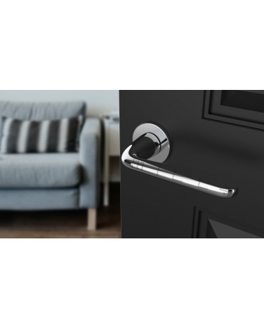 Tirador de puerta cromada brillante HIACYNTA tirador de diseño vista superior inclinada montada en una puerta