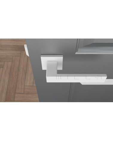 Tirador de puerta blanco PINA tirador de diseño vista superior montado en una puerta