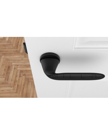Manija de puerta futurista PEONIA manija de diseño vista superior montada en una puerta