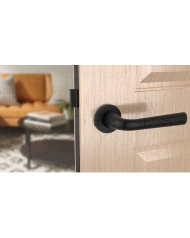 Tirador de puerta negra TULIPA puerta interior de diseño vista de frente montada en una puerta