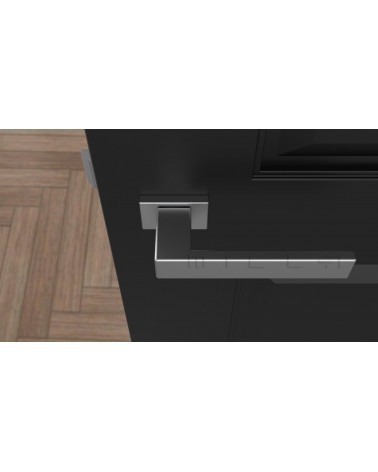 Manilla de puerta PINA manilla de diseño color 1 vista superior montada en una puerta
