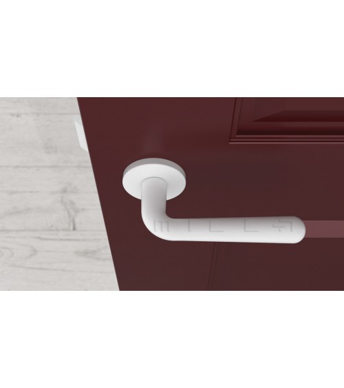 Tirador de puerta blanca mate IRGA herraje de diseño