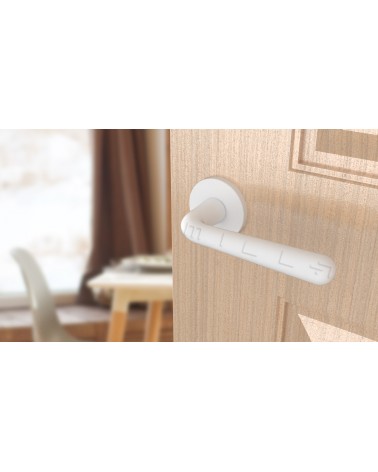 Tirador de puerta IRGA blanca mate, diseño vista inclinada montada en una puerta