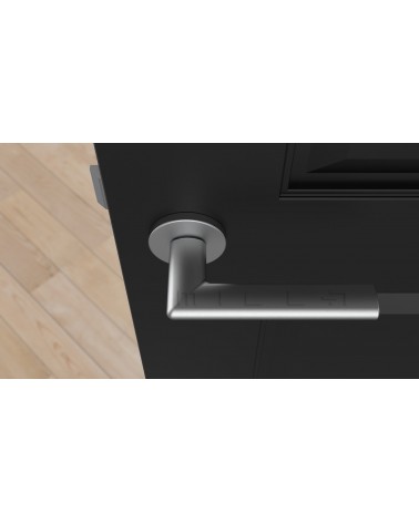Palanca de puerta cromo satinado KALMIA palanca de diseño vista superior montada en una puerta