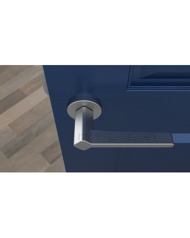 Manilla de puerta cromo satinado NINFEA manilla de diseño vista desde arriba montada en una puerta 2