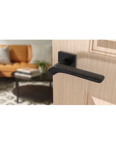 Tirador de puerta Contemporánea BERGERIA tirador design vista superior inclinada montada en una puerta