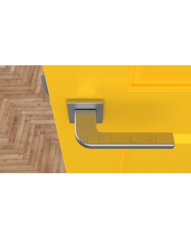 Tirador de puerta ISMENA tirador de diseño color 1 vista superior montada en una puerta