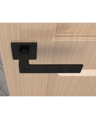 Maneta de puerta negra Apollo diseño vista superior montada en una puerta