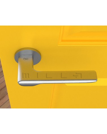 Palanca de puerta estilo moderno LIGNE manilla de diseño vista desde arriba montada en una puerta