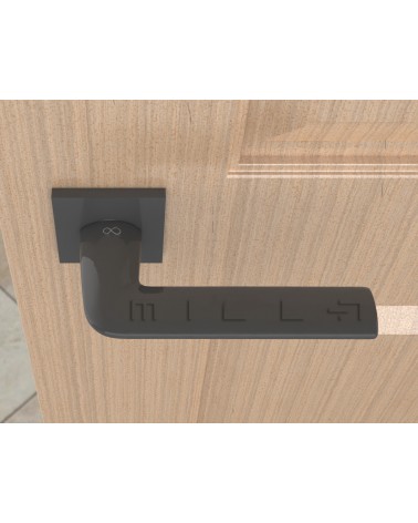 Manija de puerta titanio STINGER diseño vista superior montada en una puerta