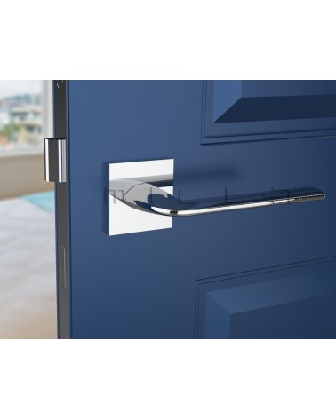 Manilla cromada pulida STINGER manilla de diseño vista frontal montada en una puerta