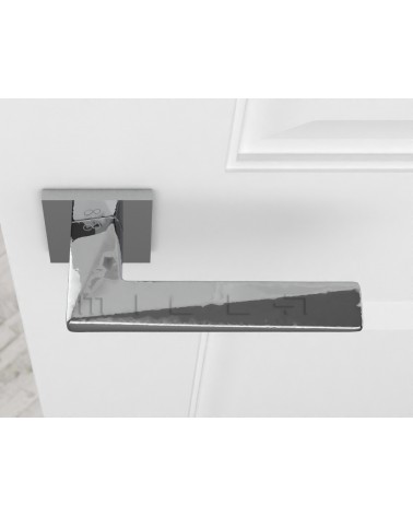 Manija de puerta moderna DIAMANT diseño vista desde arriba montada en una puerta