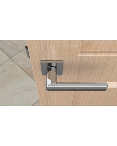 Tirador de puerta de zamak FRESIA diseño color 1 vista superior inclinada montada en una puerta