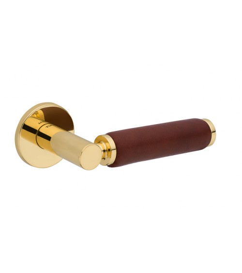 Manija de puerta dorada pulida en cuero oscuro TUPAI 4200/201 redonda - diseño de tirador
