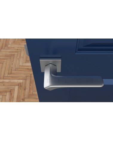Manecilla de puerta cromado satinado BERGERIA ferretería design vista superior montada en una puerta