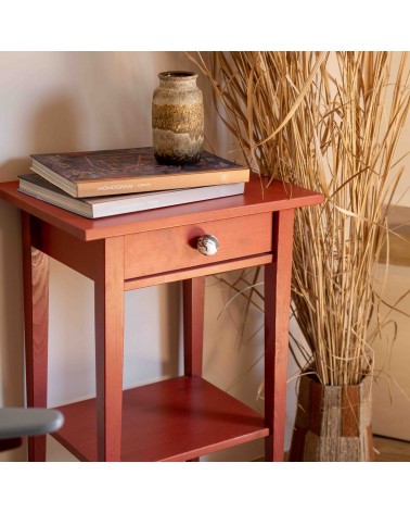 Botón de mueble en madera de haya negro tirador de diseño fijado en el cajón de un mueble