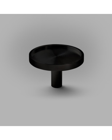 Botón de mueble negro INA BLACK tirador de diseño modelo grande sobre fondo gris