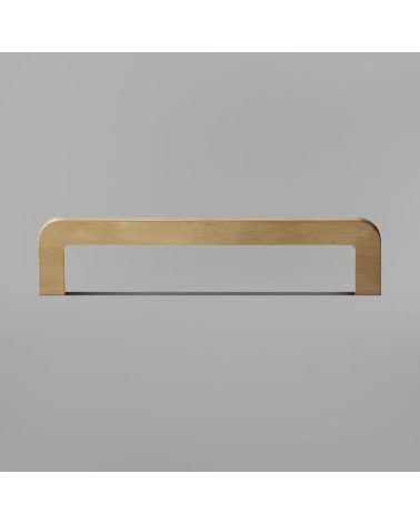 Tirador de mueble en latón cepillado ISA tirador de diseño fijado sobre una superficie