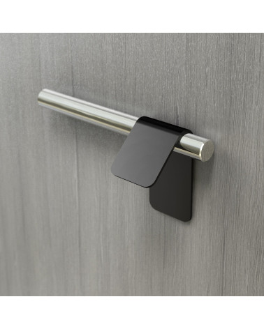 Tirador de mueble negro mate/cromo brillante TORN-3 tirador de diseño fijado en una superficie gris
