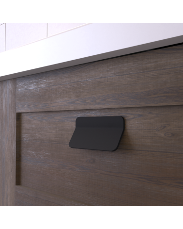 Tirador de mueble negro mate SEA diseño vista de cerca sobre cajón